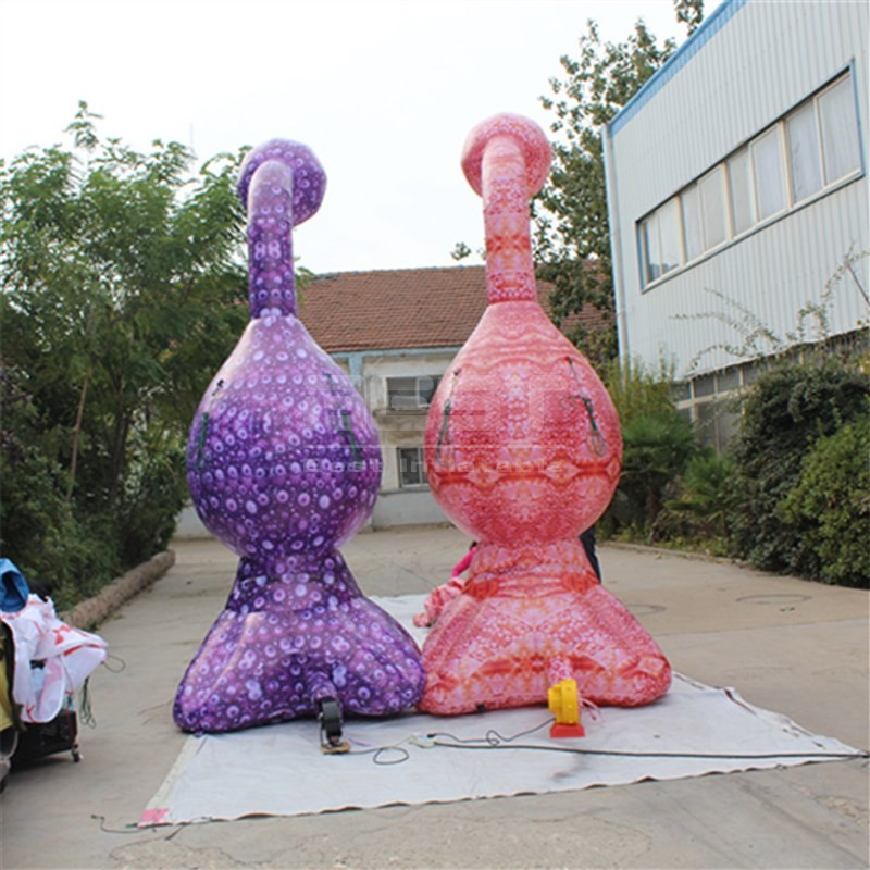 Inflatable alien eyes creature for alien themed music festival party